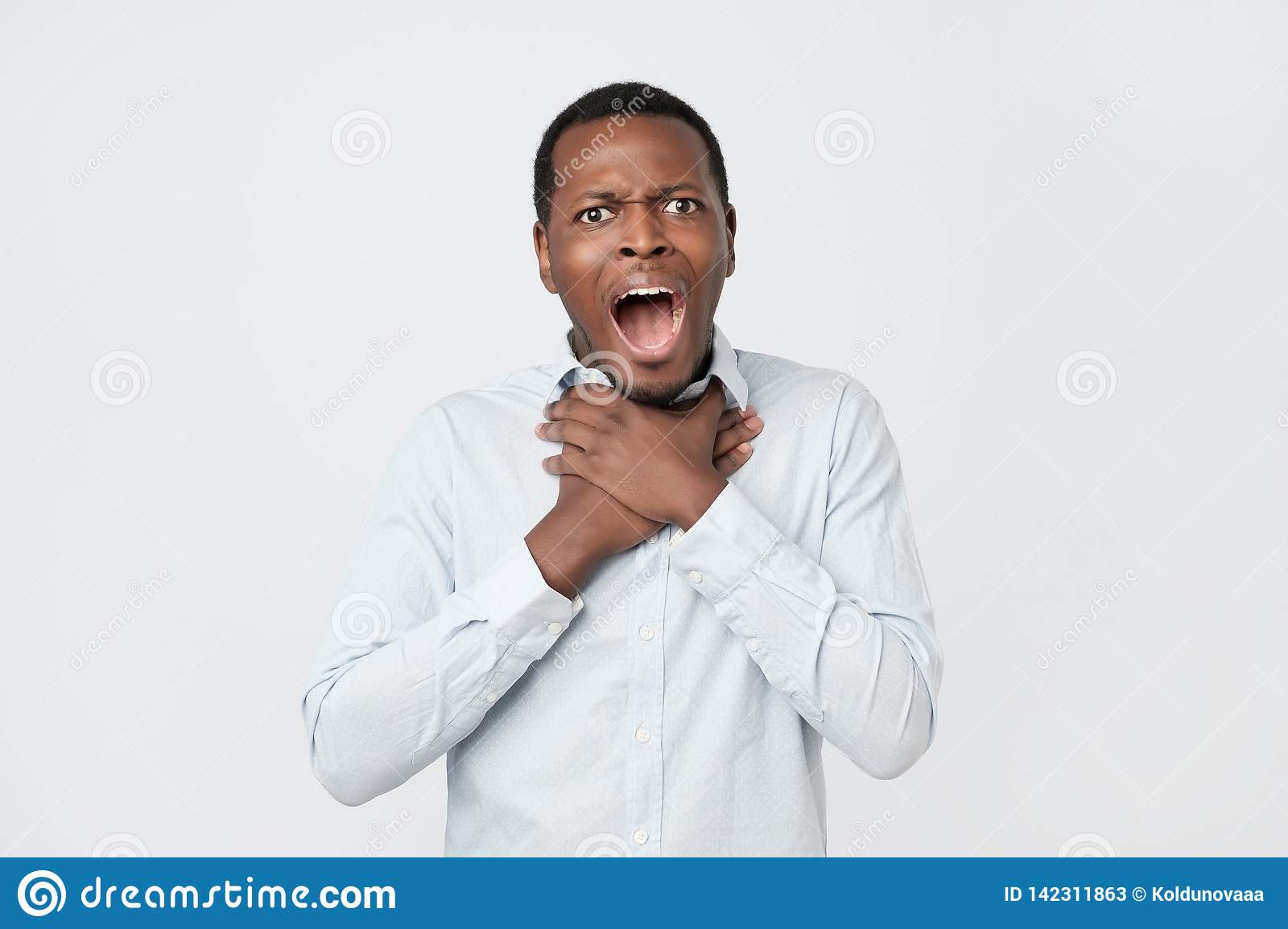 Young African Man Having Asthma Attack Or Choking Can Not ...